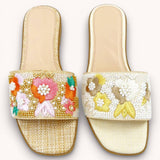 FLORA LUXE PEAR-EMBELLISHED RAFFIA SLIDE FLAT SANDALS: BEIGE