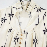 Bow print v-neck ruffle puff sleeve babydoll dress: Beige / L