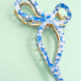 JUMBO CELLULOSE CASTING BOW HAIR CLAW CLIPS | 40H759