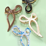 JUMBO CELLULOSE CASTING BOW HAIR CLAW CLIPS | 40H759