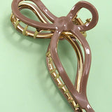 JUMBO CELLULOSE CASTING BOW HAIR CLAW CLIPS | 40H759